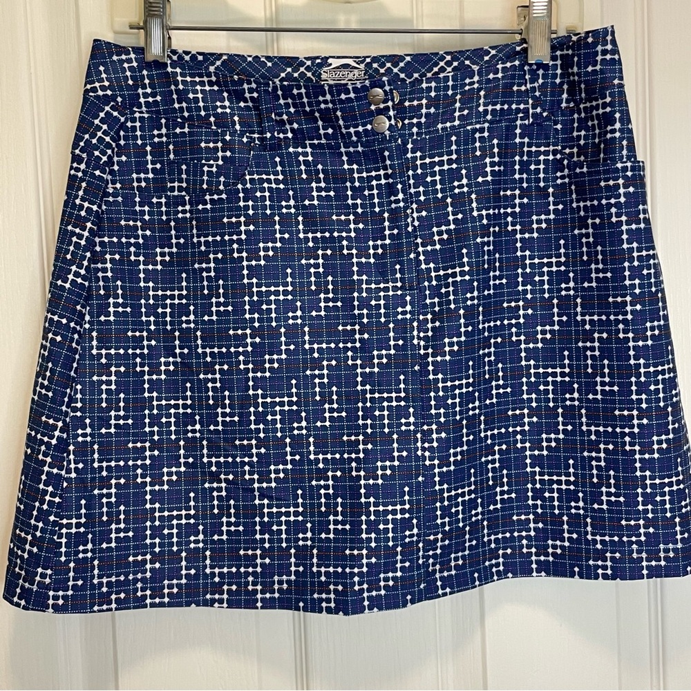 Ladie’s Slazenger woven Golf Skort.  Size 6.  Blue with white and red print
